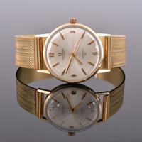 Universal Geneve 14K Gold AUTOMATIC 28 Estate Watch - Sold for $1,536 on 05-18-2024 (Lot 233).jpg